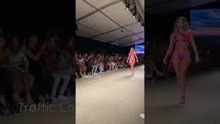 Sofia Jamora opening the Abyss by Abby runway show with a sexy and modern hot pink bikini