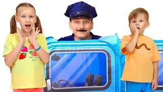 Dad teaches children to play hide and seek with costume dress up