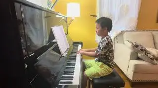 The bee and the clover from John Thompson’s modern course for the piano the second grade book