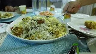 Mutton biryani meal in a bowl on table