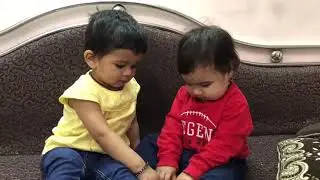 Two Cuties playing