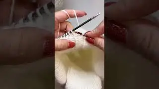 Кеттлевка на шапке ушанке. Замыкание в круг набранных петель.