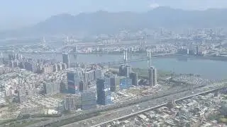 20220311飛機降落松山機場進場前縮時窗景