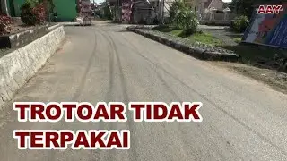 Pegajuan ke PU (pekerjaan umum) Pembuangan Trotoar dan pemasangan blok parit