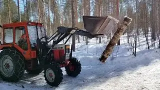 Lifting logs from under the snow with Belarus 820 progress