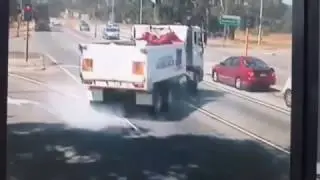 Truck doesn't have time to stop at a red light!