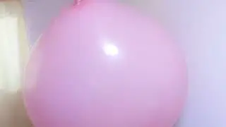 Pink big balloon vs 75cm yoga ball