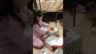 Karina opens gifts