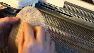 Knitting socks on a machine