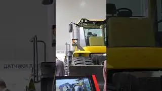 Кировец К-708БКУ бульдозер-погрузчик - новинка на #стт2023