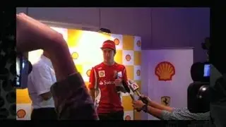 Ferrari driver tries driving simulator in Singapore