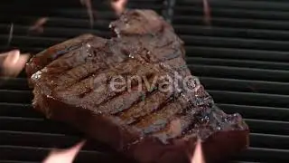 T-Bone steak on grill in slow motion, shot on Phantom Flex 4K | Stock Footage - Envato elements