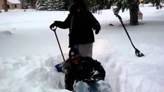 Keshaun falls in the snow