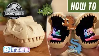 Hatch, train, and battle dinosaurs! Bitzee Featuring Jurassic World toy!