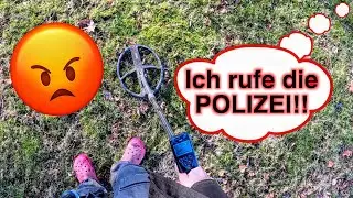 Angry woman threatens police while treasure hunting with metal detector in park (detecting)