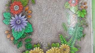 Coloring Fall flowers in Small Victories by Johanna Basford with Grizaye oil based pencils.