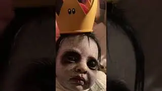 Creepy baby in a tiara  ￼