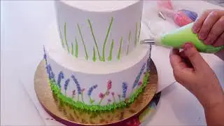 Assembling and securing a two-tier cake