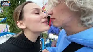 PARADEVICH AND KAYA KISS AT THE AMUSEMENT PARK