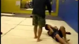 Martin 'accidently' headkicks Boon.