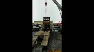 Разгрузка неисправных бульдозеров