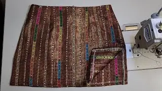 sewing a beautiful skirt for the woman...