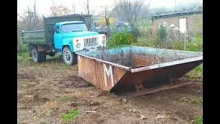 Газ 53 тащит лодку.