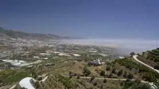 Sea fret timelapse over beach at nerja spain