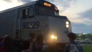 NPCU 90229 leads #371 the Amtrak Pere Marquette into Holland Mi
