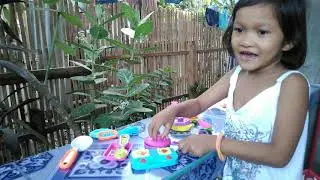 April Joy playing at home