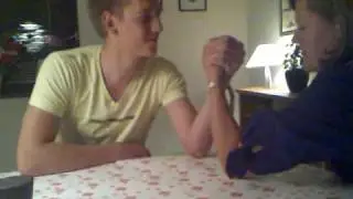 Mother and son armwrestling