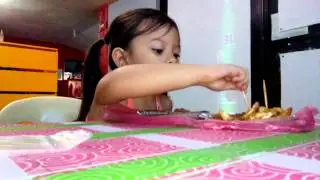 Chloe eating street foods