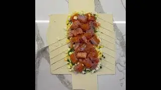 Слоеная плетенка с форелью и яйцом