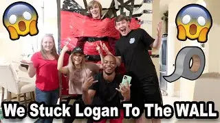 WE TAPED LOGAN TO THE WALL!!!