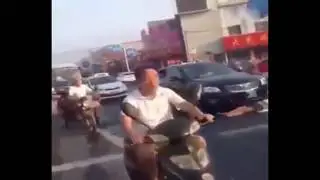 LiveLeak - Woman pretends to get hit by car Gets what she deserve