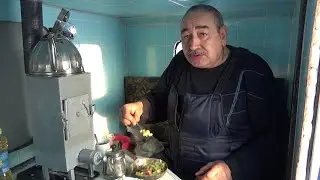 Frying potatoes while winter fishing