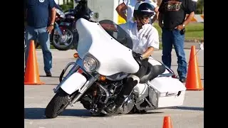 How many hours of training are needed to handle a heavyweight bike with skill and ease?