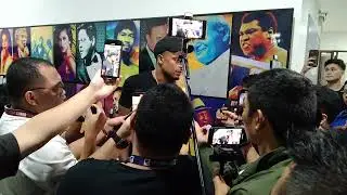 Justine Brownlee holds court among members of the media after the Game 3 win