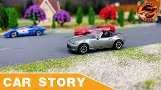 Diecast Duel: Watch Mazda and American Muscle Car Battle it Out on Tiny Streets!