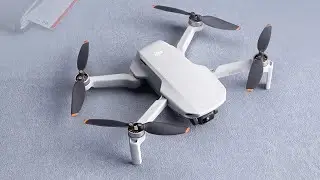 DJI Mini 2 – Ultralight and Foldable Drone Quadcopter, 3-Axis Gimbal with 4K Camera, 12MP Photo