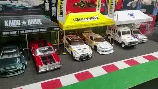 MINI GT Paddock Service Tent Set with Extra Wheels "Liberty Walk-LB Racing" for 1/64 scale models