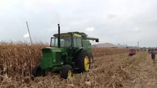John Deere 4620 shelling corn with 7721 pull type combine