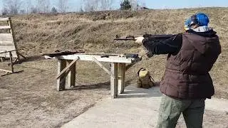 woman and AK 47