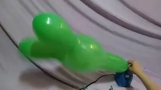 GREEN BUNNY SHAPED BALLOONS  PUMP TO POP!