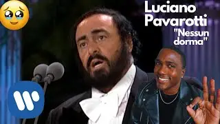 first time watching!  Luciano Pavarotti sings 