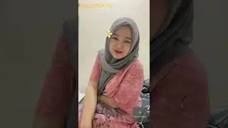 Mom Biti chatting on the bed