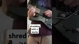 GUITAR SHREDDING WITH A DORITO #metal #guitarmusic #prog