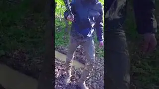 Boots and clothes are in the swamp. White leather boots, swamp. Весна.