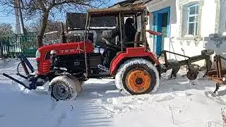 Відчипив плуг та трохи розчистив сніг.