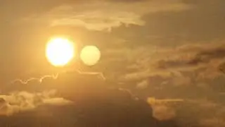 2 sun's and a small planet above the sun's.